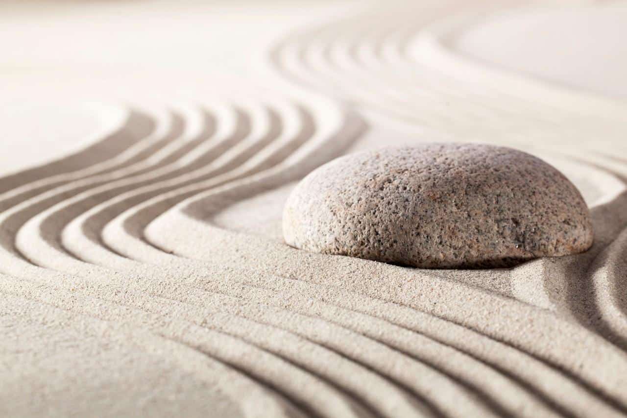 zen garden with sand and stone; Recruiting Autistic Candidates concept