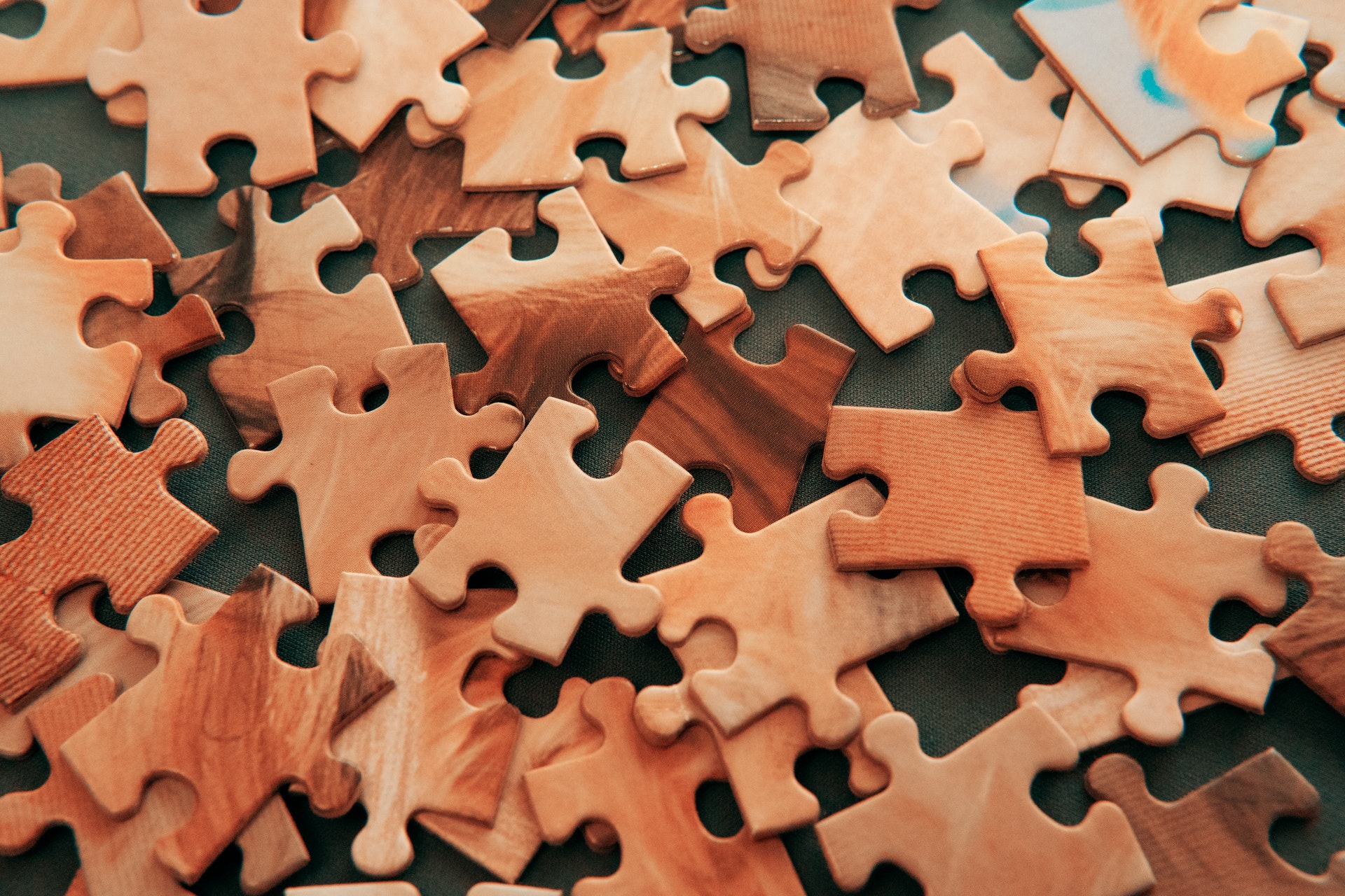 a pile of puzzle pieces; tech insights and contingent work concept