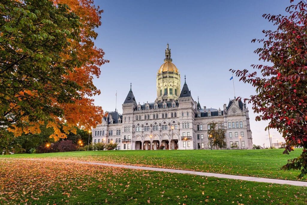 Connecticut state capitol building; DEI in state hiring concept
