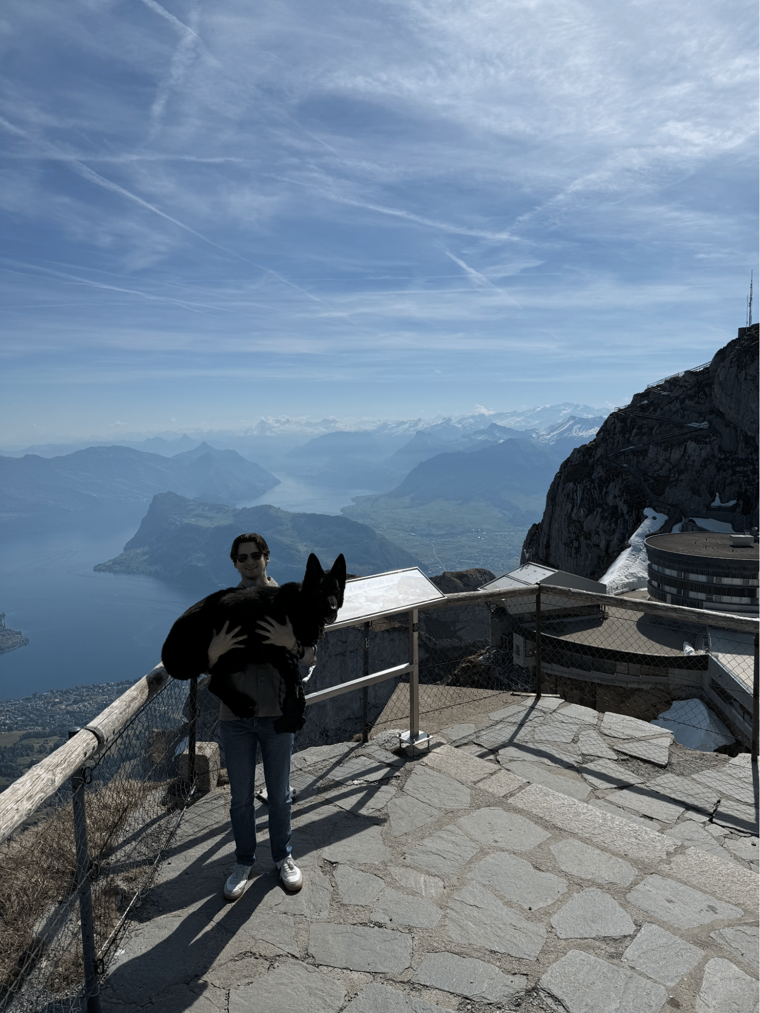 Daniel and his dog on the mountain