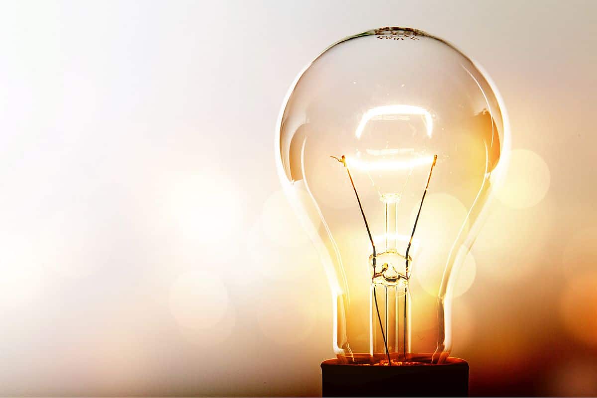 Glowing glass light bulb on background; ; Talent Management Employee Expectations concept