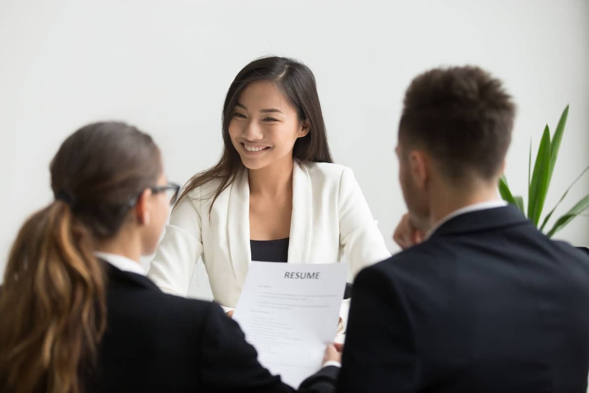 Confident millennial applicant smiling at job interview, Ethical Employer Branding concept